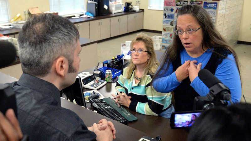 Same-sex couple denied marriage licenses from county clerk awarded $100,000 in damages