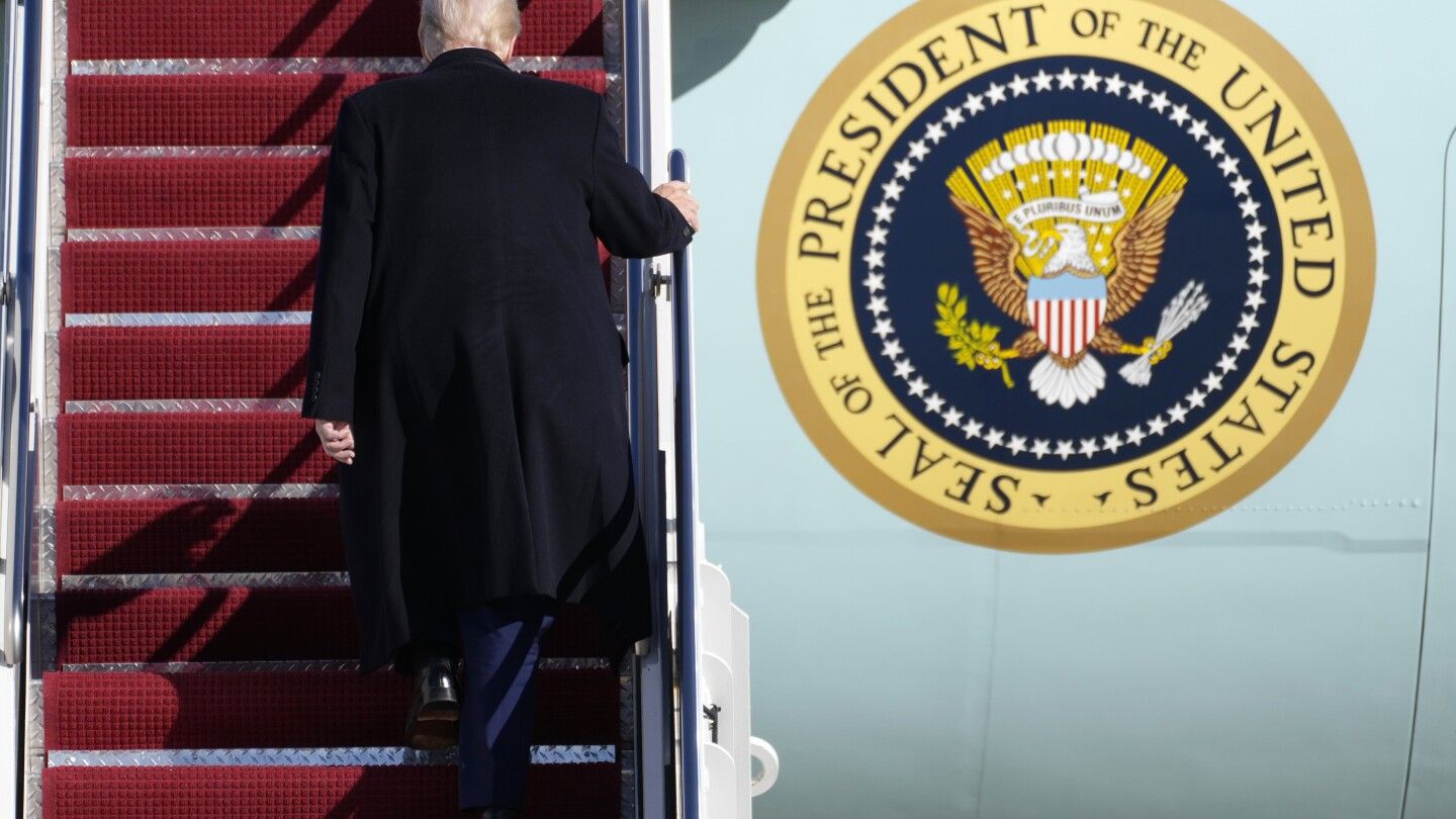 Trump tours Boeing plane to highlight aircraft maker's delay in delivering a new Air Force One