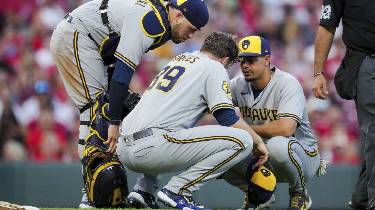 Brewers’ Burnes nearly faints in sweltering heat, fans 13 in 1-0 win over Reds