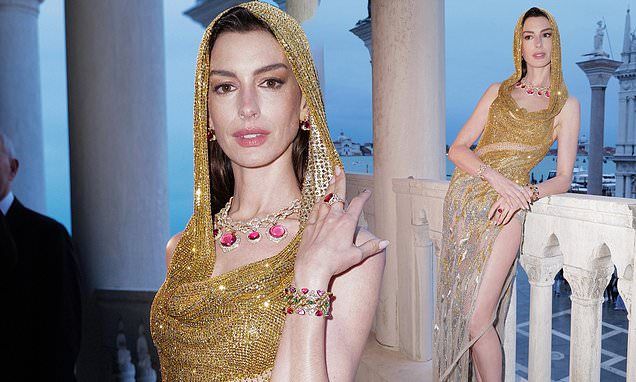 Anne Hathaway dazzles in gold hooded gown with racy thigh-high split at Bulgari party in Venice