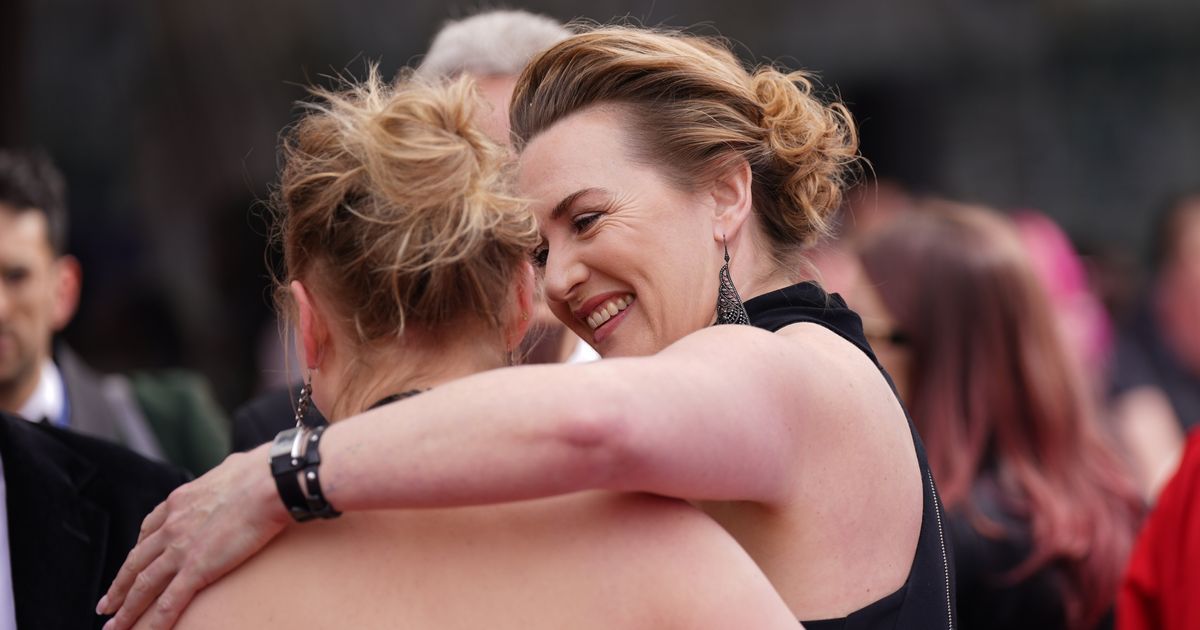 Kate Winslet Walks BAFTAs Red Carpet With Daughter