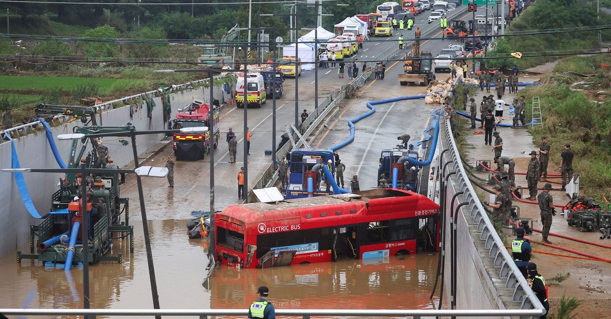 Rescuers retrieve eight bodies from flooded South Korea underpass