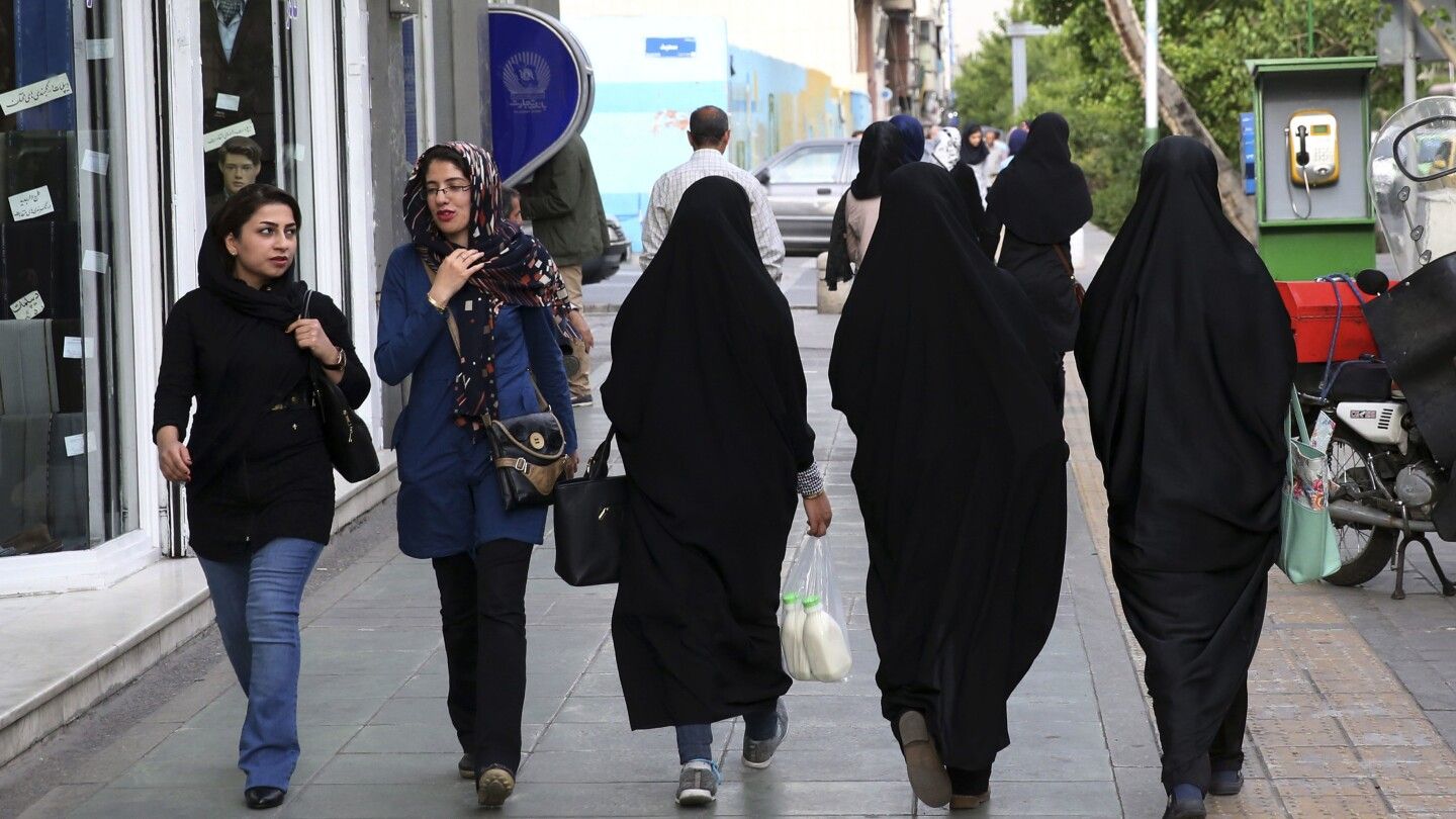 Iran's morality police return after protests in a new campaign to impose Islamic dress on women