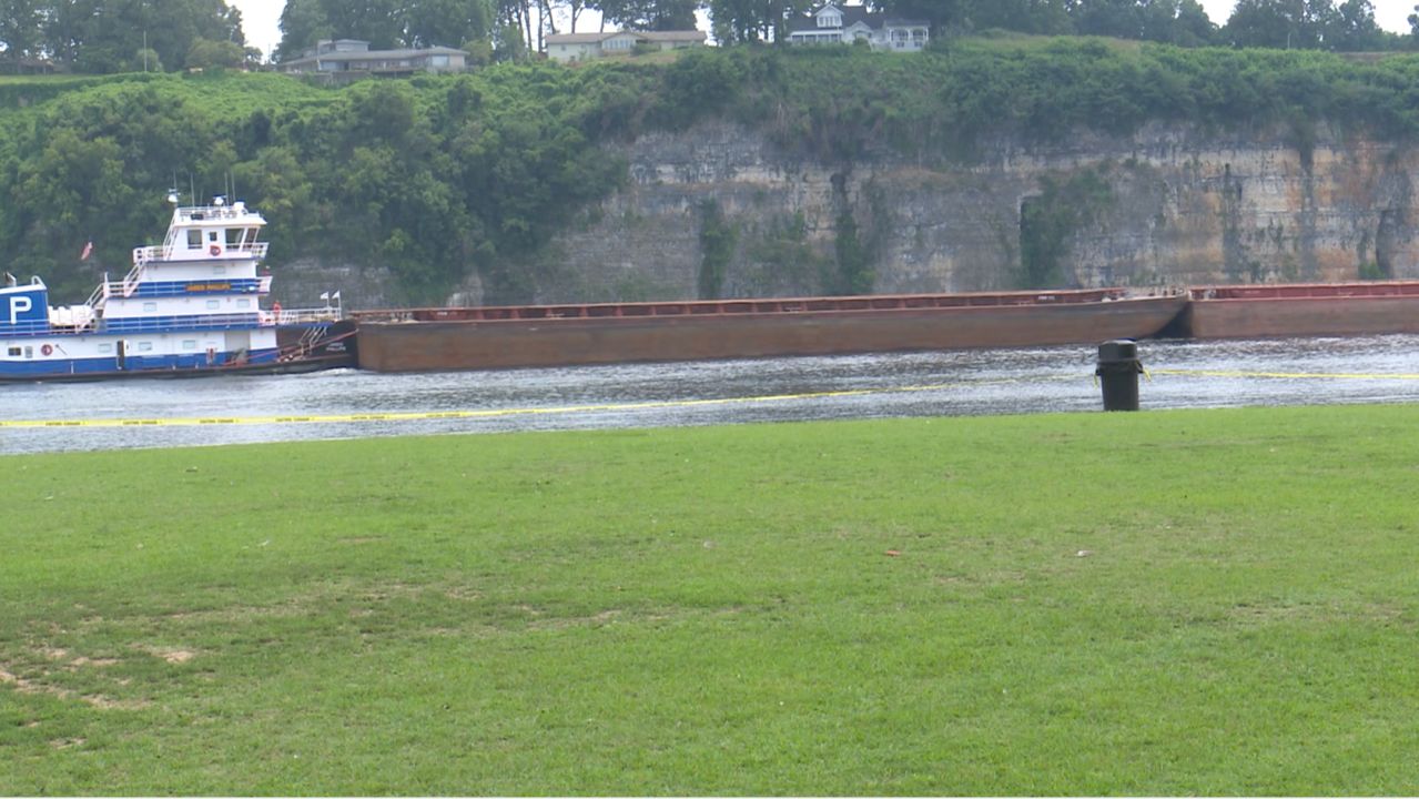 Diesel fuel washing up on shore of McFarland Park after tug boat sinks