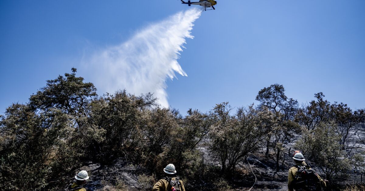 Amid California heat wave, firefighters battle 7,600-acre wildfire