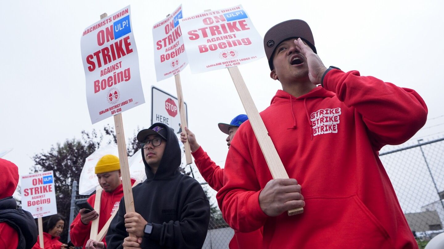 Boeing says it's considering temporary layoffs to save cash during the strike by machinists