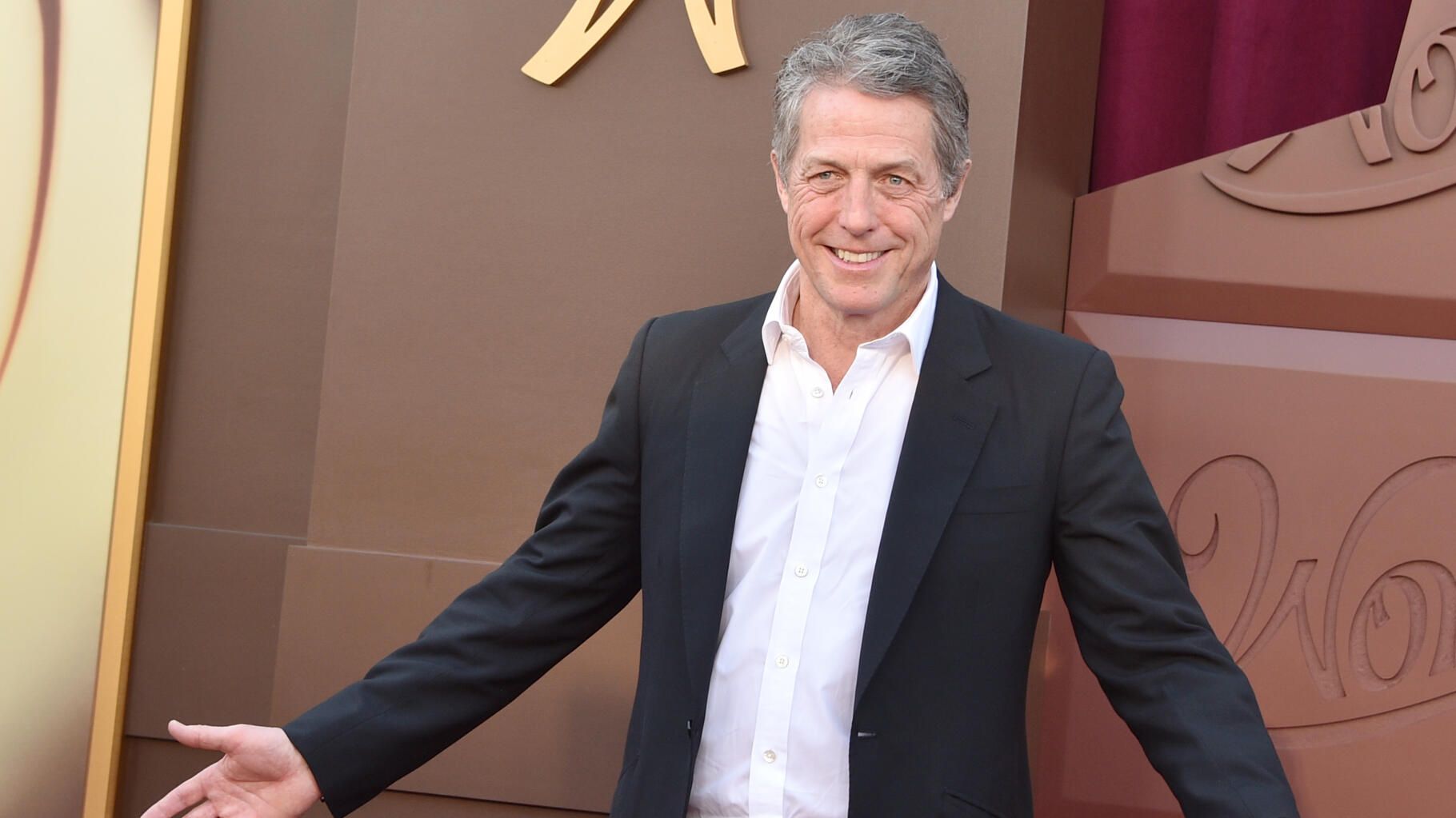 Hugh Grant ironise sur l’accord financier conclu avec le tabloïd " The Sun " qu’il poursuivait