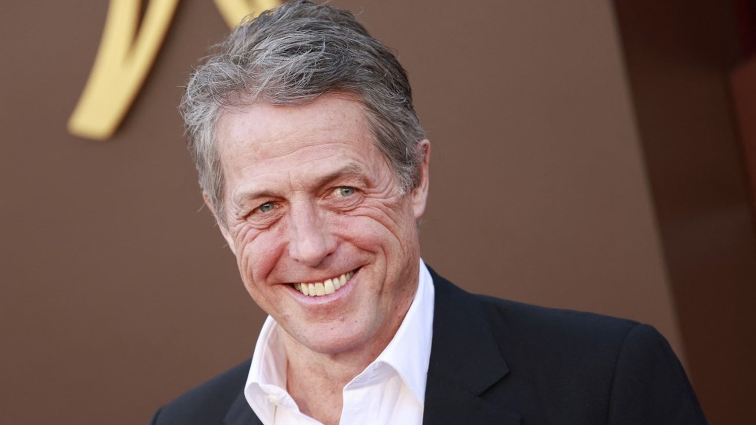 Royaume-Uni : l'acteur Hugh Grant conclut un accord financier avec le tabloïd "The Sun" qu'il poursuivait