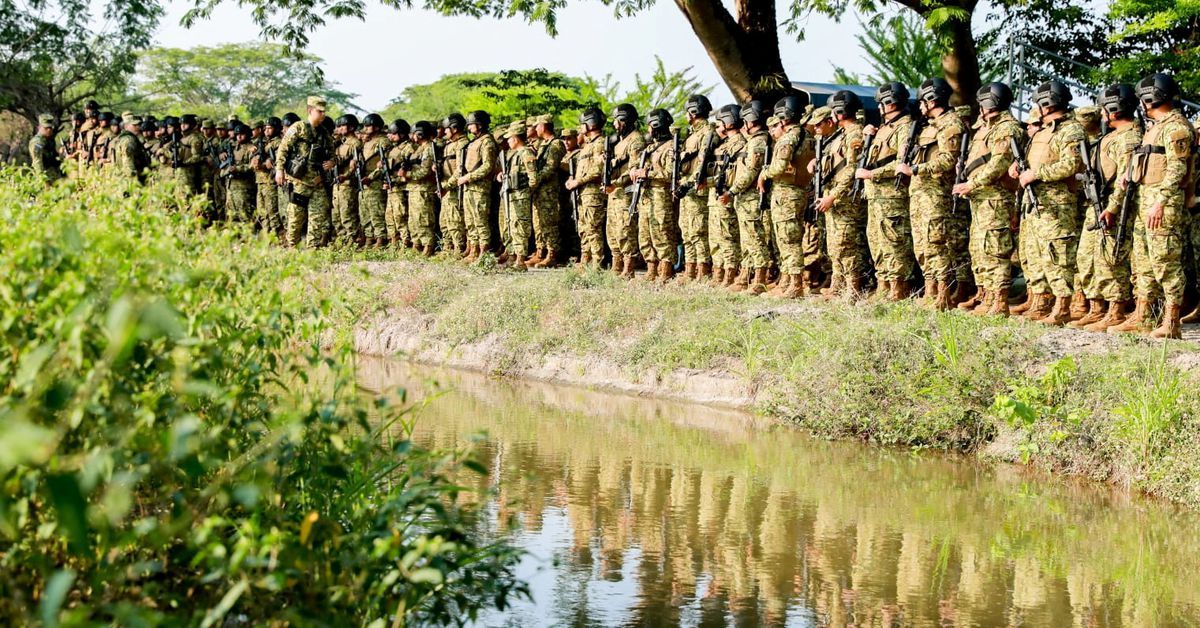 El Salvador forces surround town in north after police killing