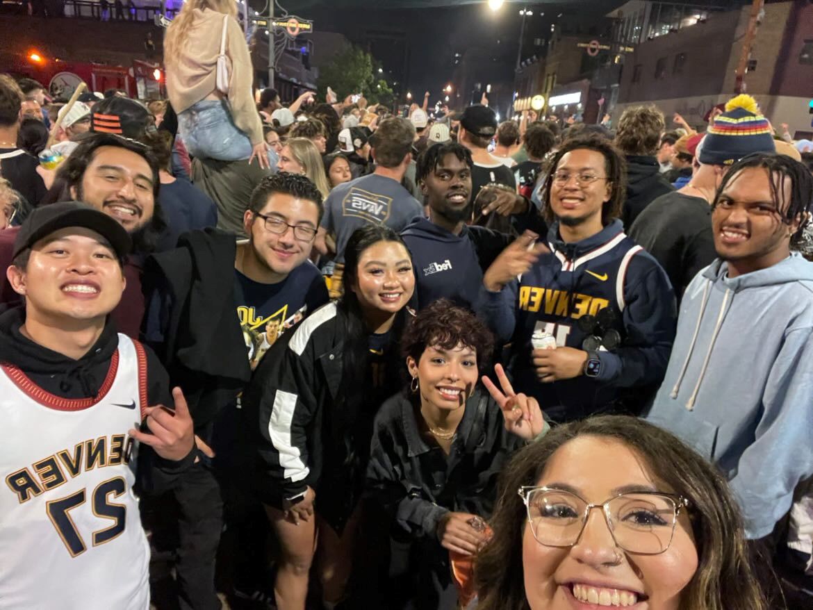 Friends celebrating Nuggets win among 10 people shot