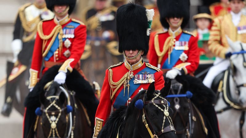 King Charles III rides on horseback in first official birthday parade