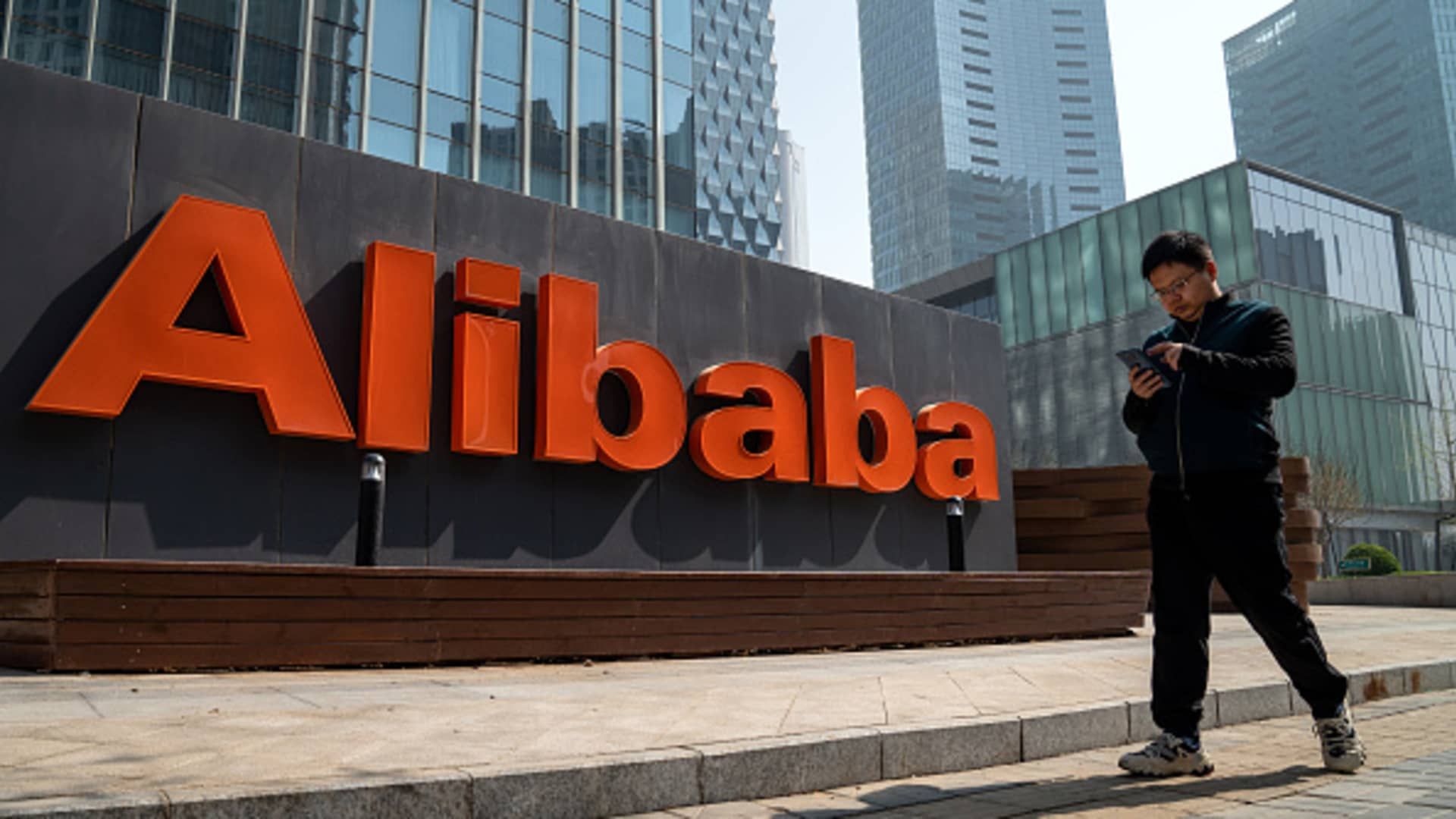 Alibaba shares dip as quarterly revenues miss expectations