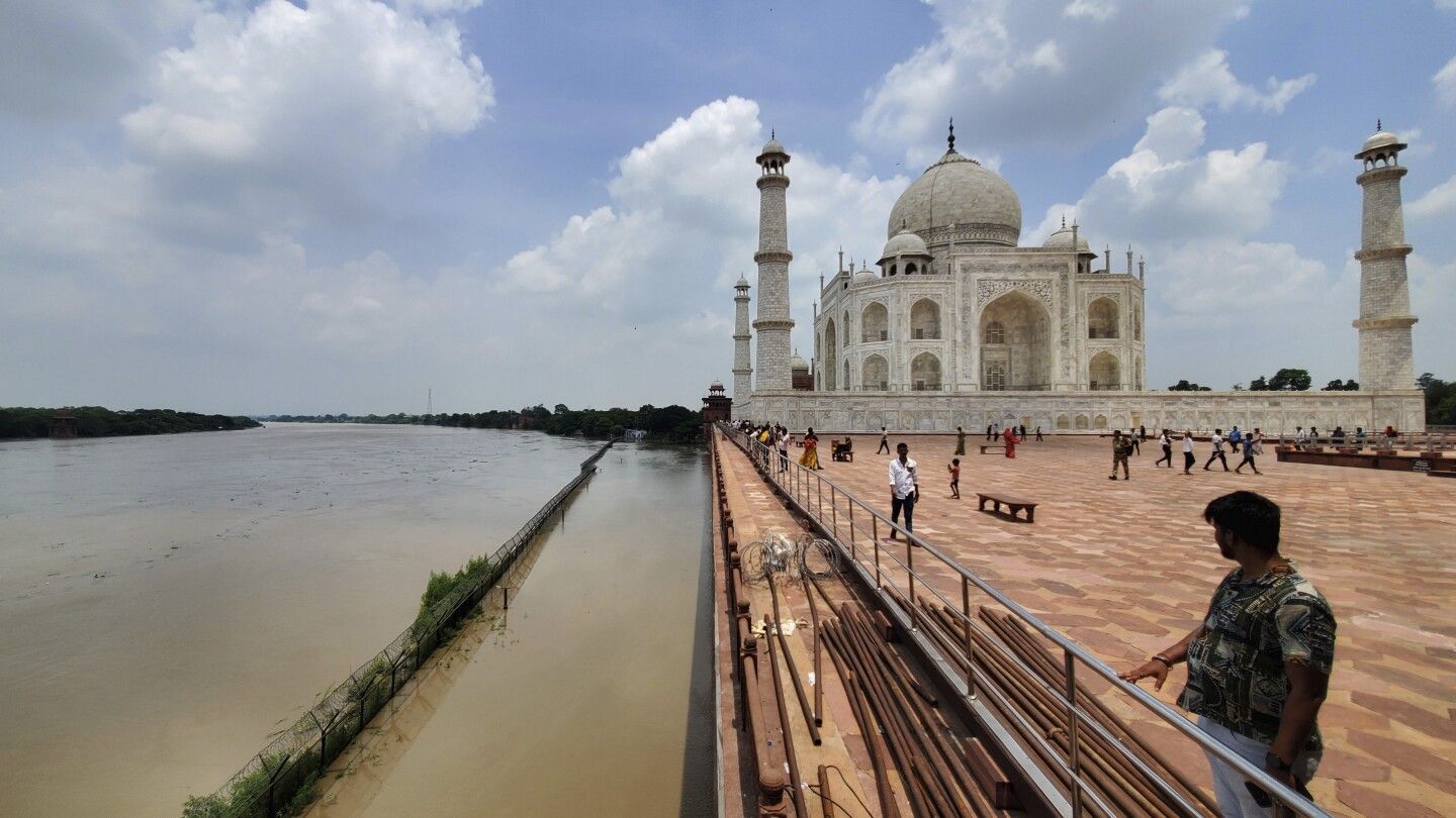 Yamuna river reaches the iconic Taj Mahal's outer walls in India after swelling with monsoon rains