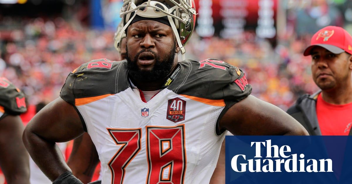 Ex-NFL player Gosder Cherilus arrested after allegedly urinating on woman during flight