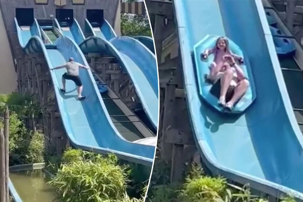 Father climbs up theme park's water slide to rescue trapped daughter