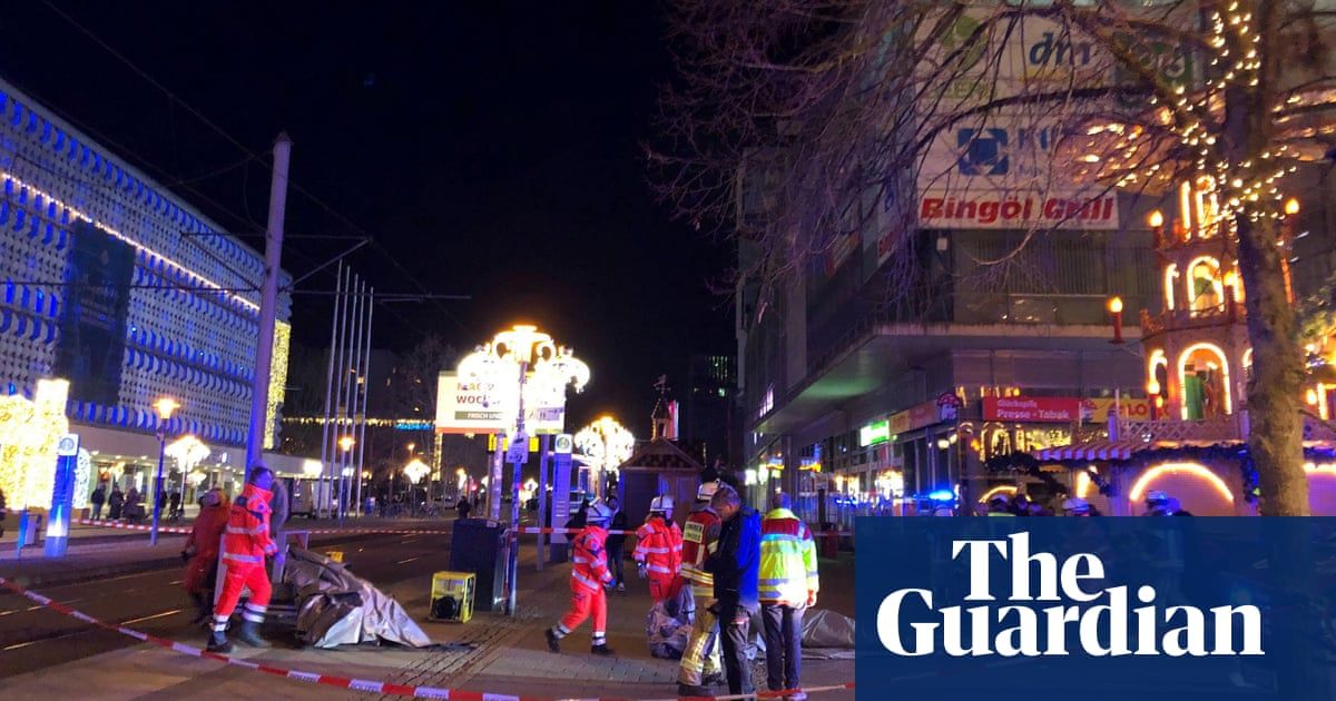 Two killed and scores injured in Germany as car ploughs into crowd at Christmas market