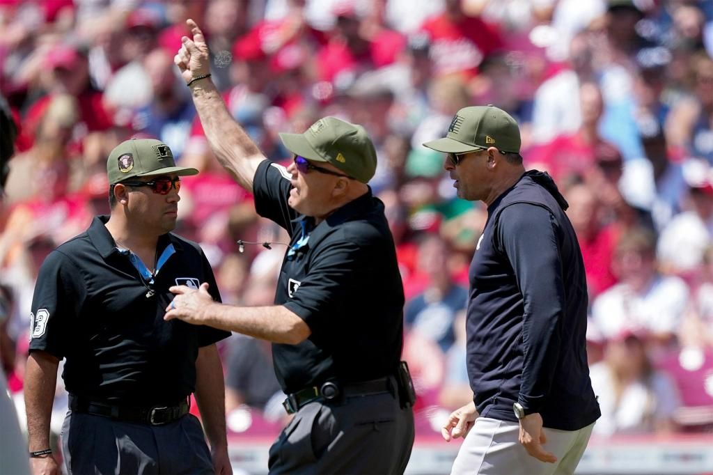 Aaron Boone ejected in first inning after Reds challenge leads to run