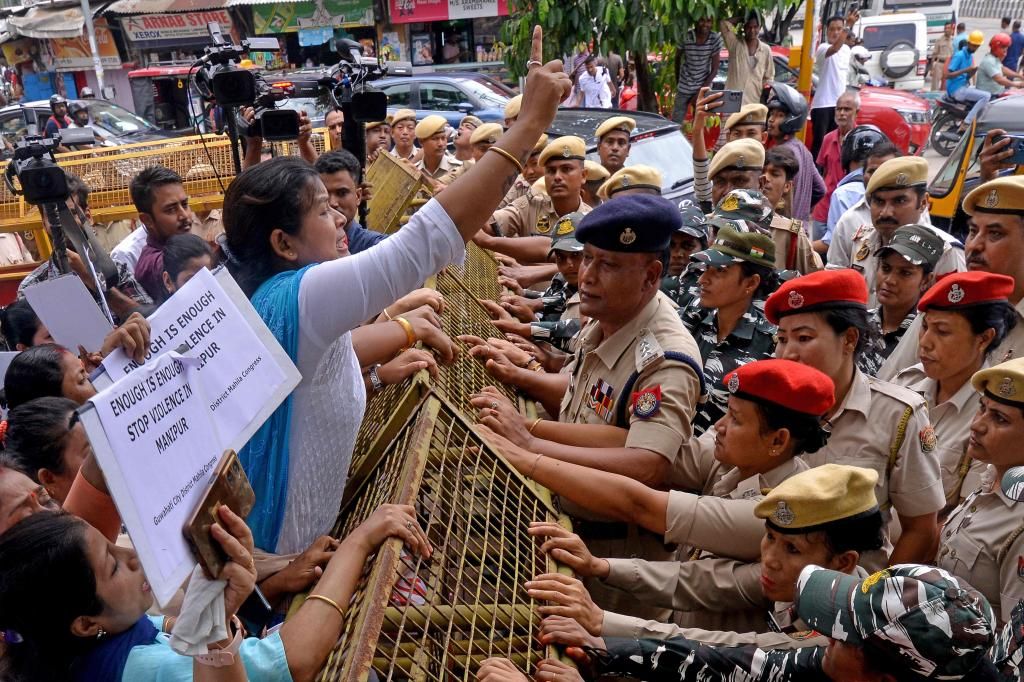 Indian police arrest 4 in rape of women who were paraded naked through street before assault