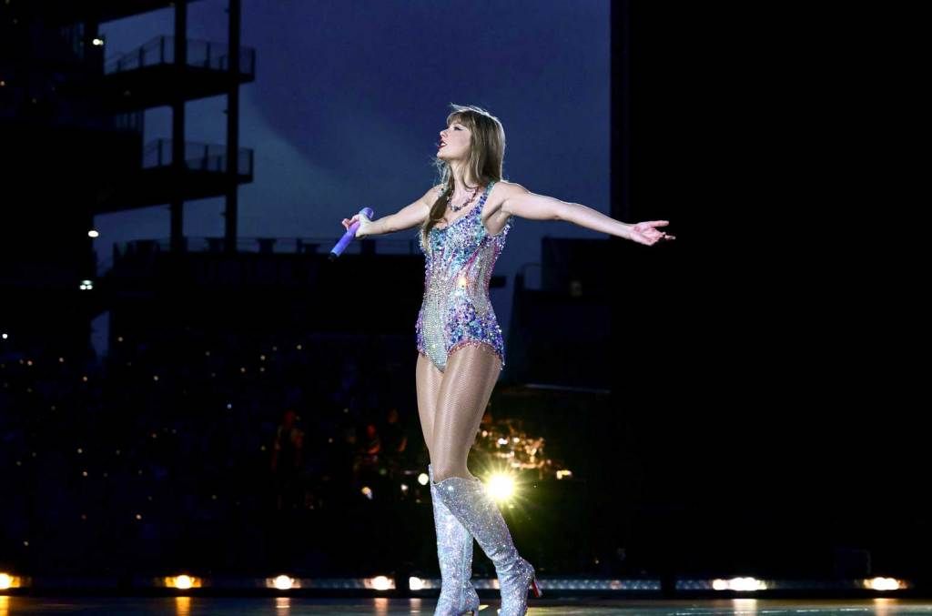 Taylor Swift Danced in the Rain During a ‘Full On Deluge’