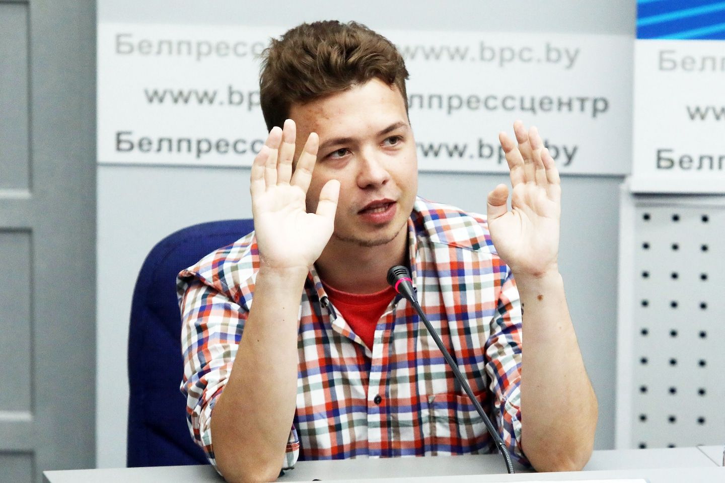 Belarus pardons opposition blogger arrested after plane's forced landing