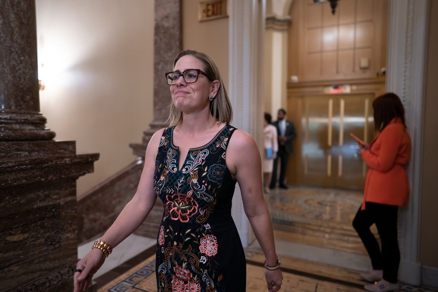 Sinema cites bill targeting leaders of failed banks after criticism of her Wall Street ties