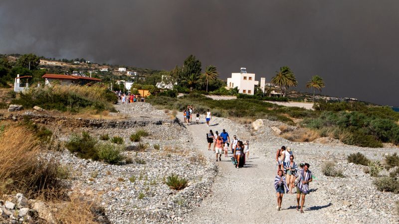 Greece evacuates thousands of tourists in Rhodes as wildfire burns