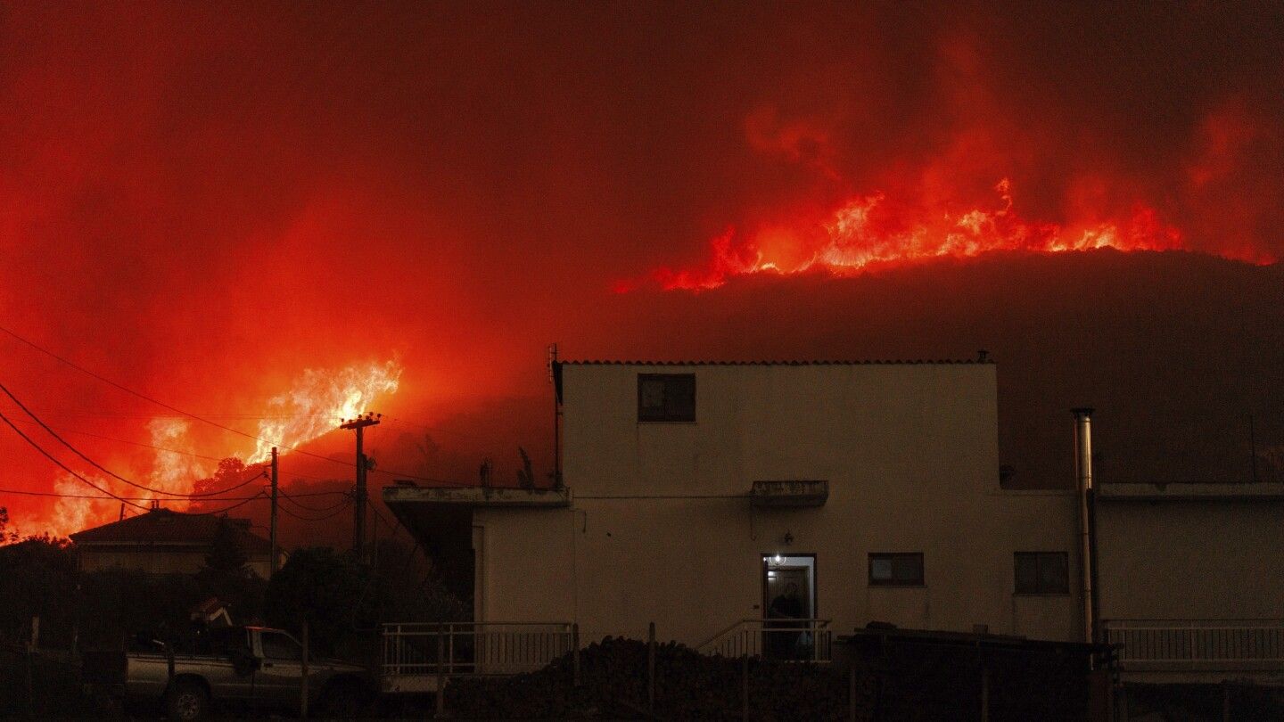 Bodies of 18 people found in area struck by wildfires in Greece