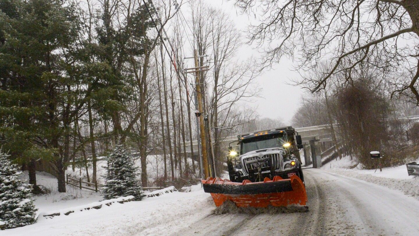 New England battles a mix of wind, rain, sleet and heavy snow