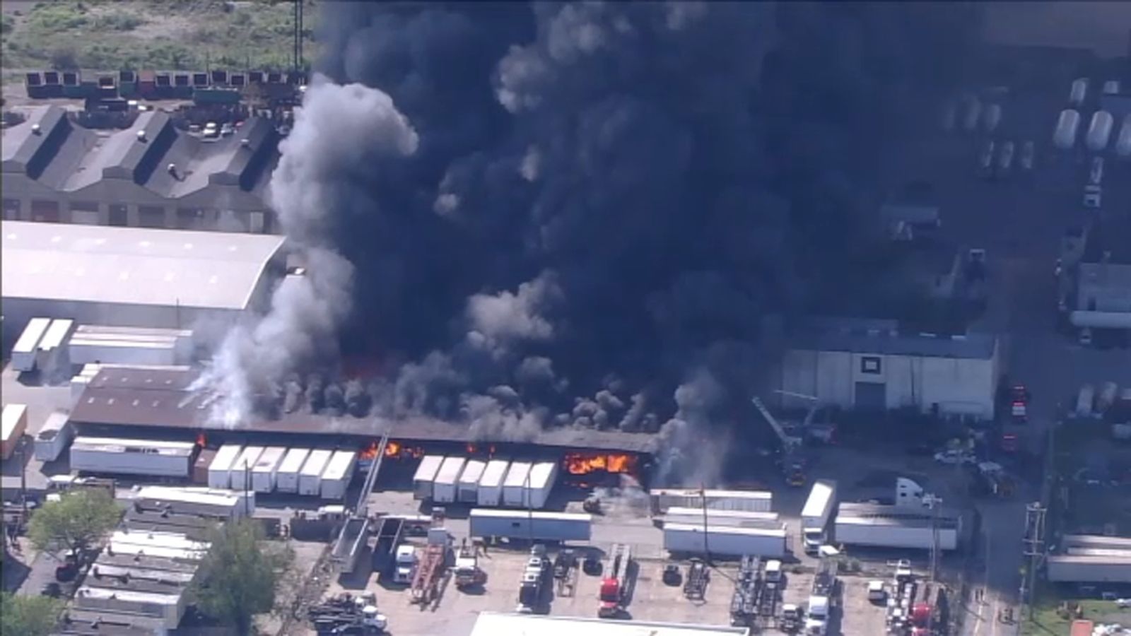 Firefighters battling 4-alarm warehouse fire in the Wissinoming section of Philadelphia