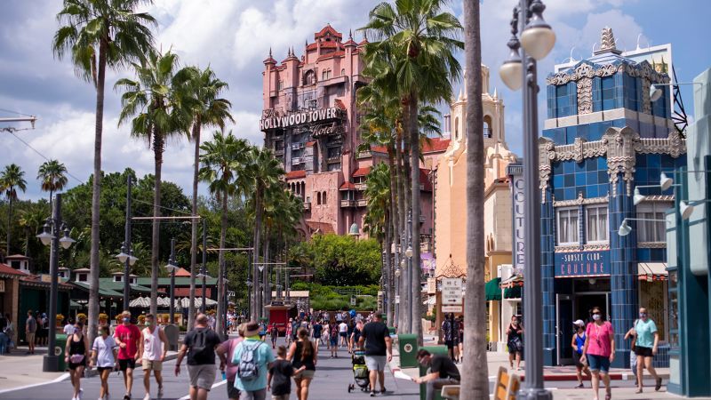 Disney employee accused of taking videos up park guests' dresses and skirts for years is fired and arrested