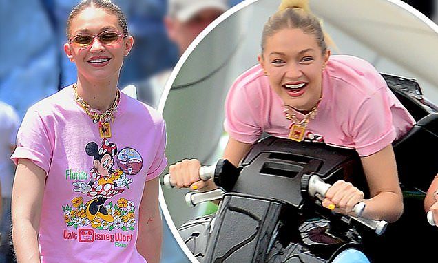 Gigi Hadid models pink to celebrate 28th birthday at Disney World