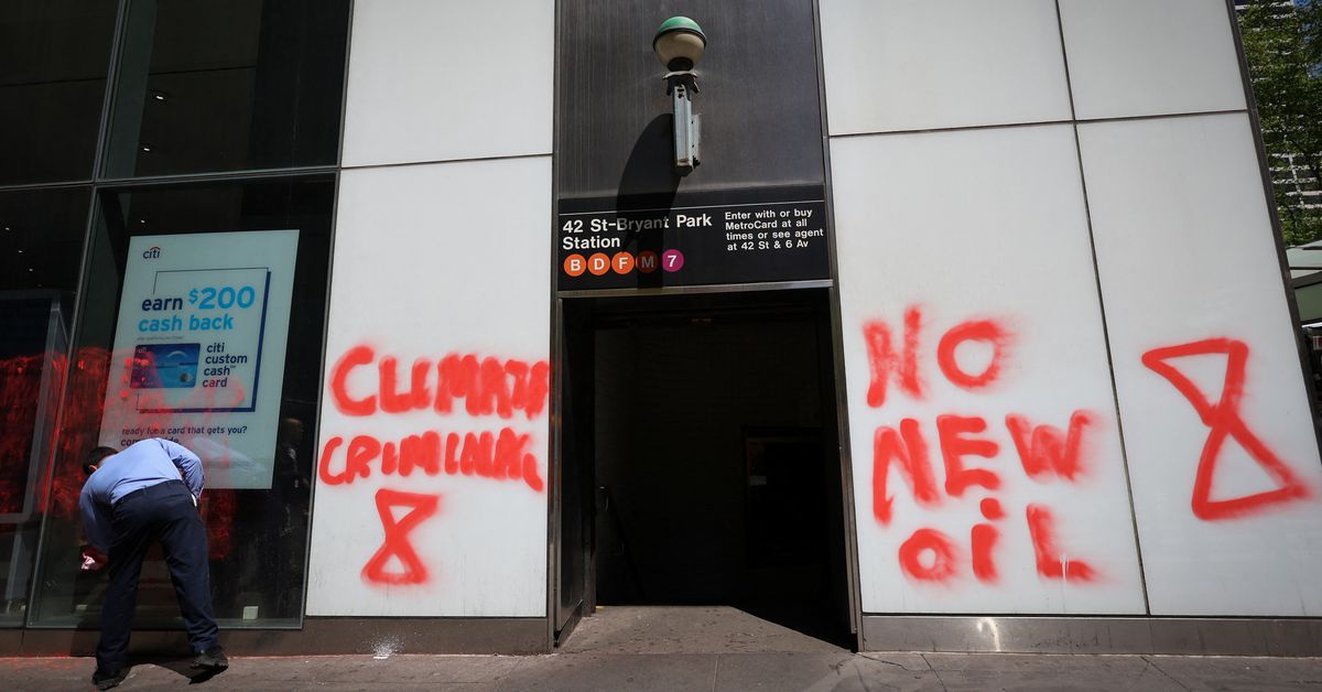 Climate activists spray protests on U.S. bank offices on eve of annual meetings