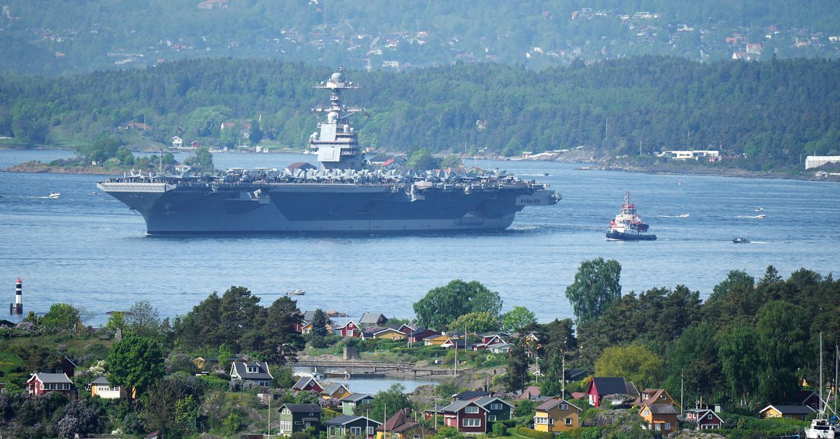 Massive US aircraft carrier sails into Oslo for NATO exercises