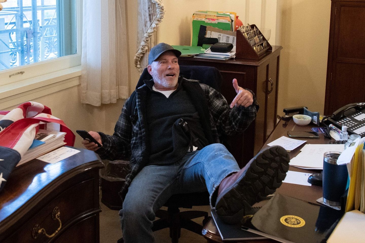 Rioter pictured with a foot on a desk in Pelosi’s office gets 4.5 years