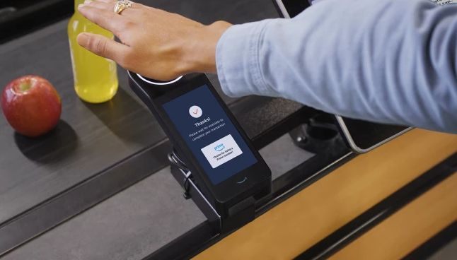 How does Whole Foods’ new palm reader payment system work?