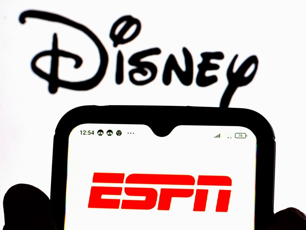 ESPN Drawn Into Disney Layoffs, Though Most Talent Decisions Coming Later This Year; Streaming Chief Russell Wolff, 43-Year Publicity Vet Mike Soltys Among Dozens Exiting