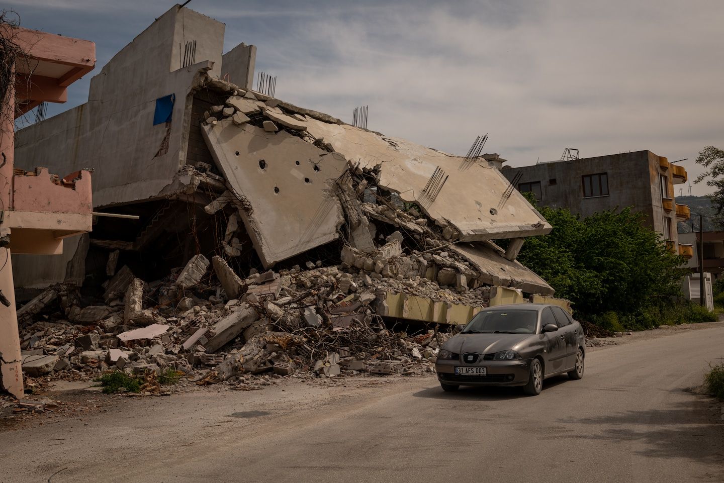 A new threat rises in earthquake-battered Turkey: Mountains of rubble