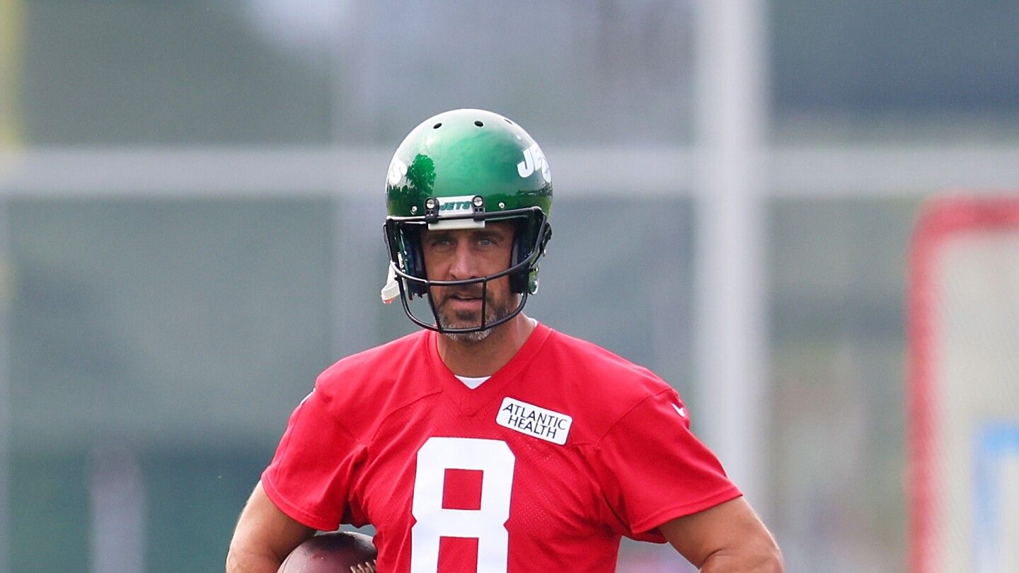 More than anything else, Aaron Rodgers looks skinny in his new uniform