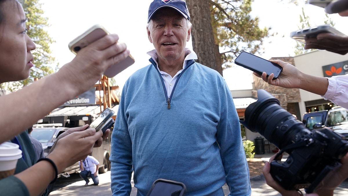 Biden mocks 'handsome guy' Trump for his mugshot as he is BOOED coming out of a pilates class during Lake Tahoe vacation and doesn't address bombshell claim he and Hunter accepted bribes