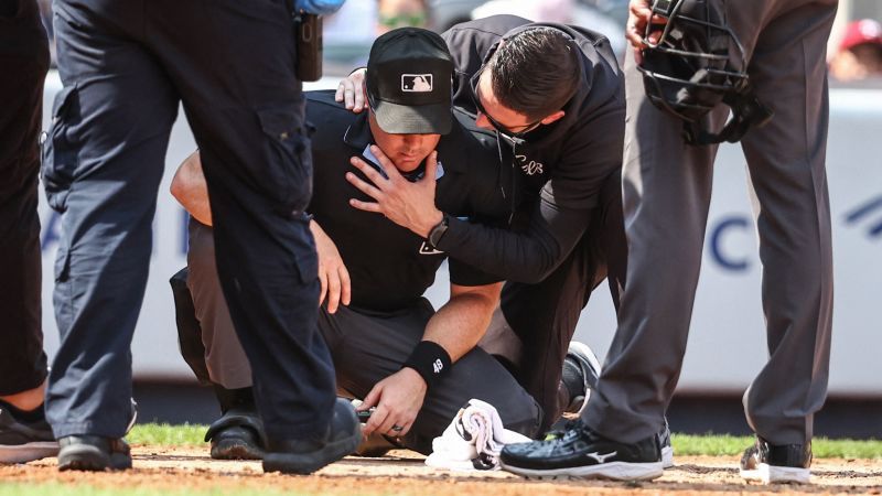 Umpire Nick Mahrley struck by broken bat and taken off on gurney