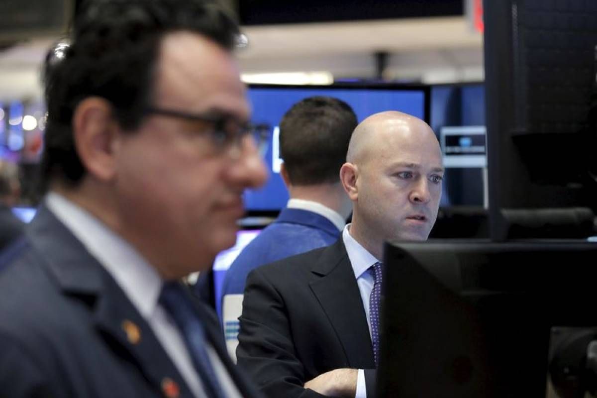 Wall Street ouvre sur une note prudente une semaine chargée