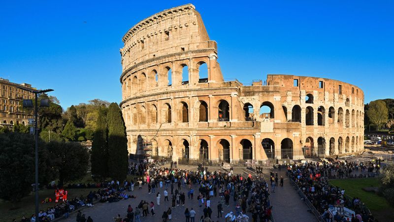 Tourist filmed carving his girlfriend's name into Rome's Colosseum