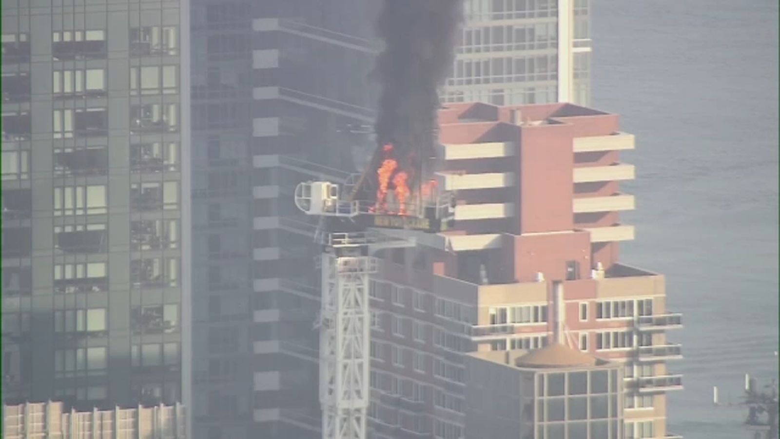 Crane catches fire, partially collapses on 10th Avenue in Manhattan