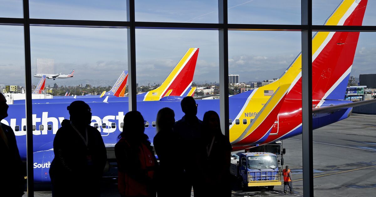 Southwest pilot climbs into cockpit window after locked out