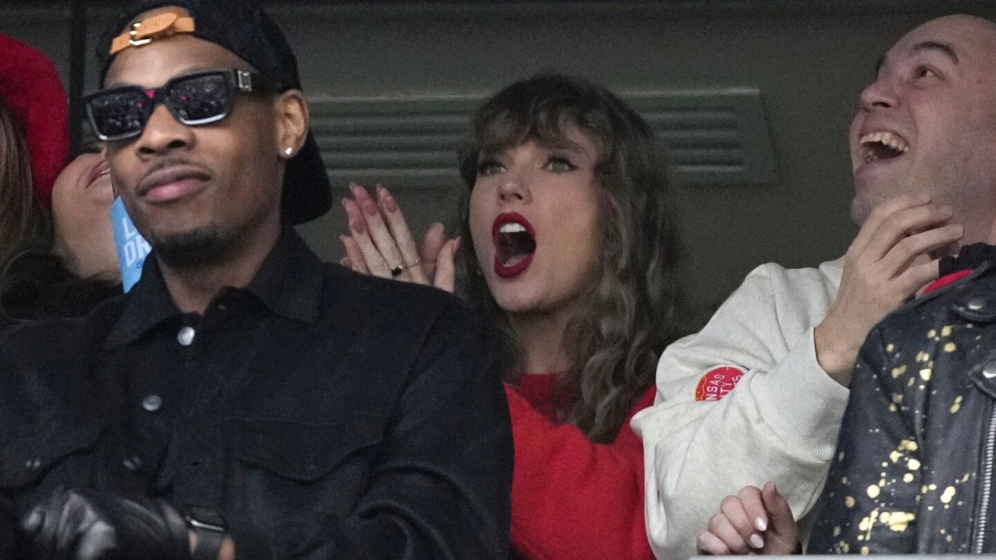 Taylor Swift gets an early reason to celebrate at AFC title game as Travis Kelce makes a TD catch