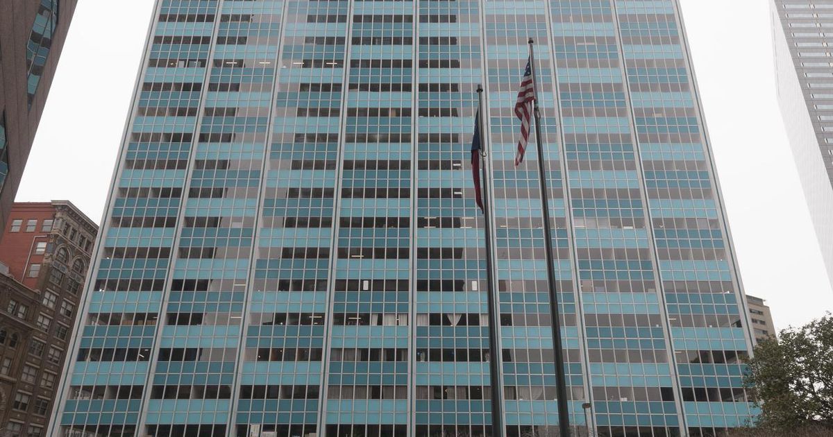 Bright-hued downtown Dallas tower set to become apartments