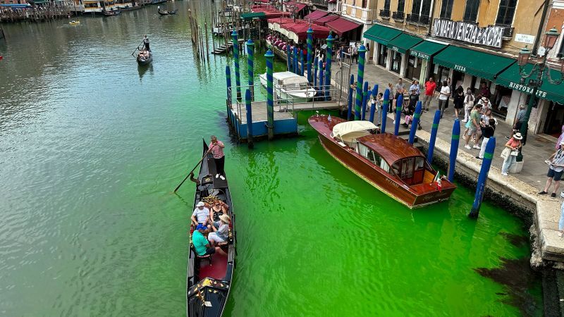 Venice authorities investigate after canal turns fluorescent green