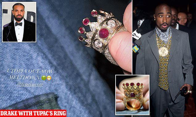 Did DRAKE buy Tupac's $1 million ring? Rapper shows off late star's custom gold, diamond and ruby ring that he wore days before he was shot dead - after it was sold to a mystery buyer in record auctio