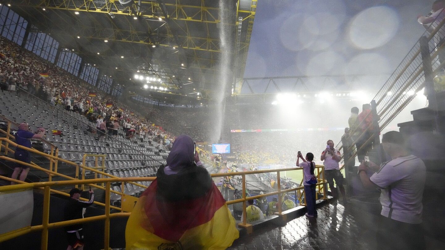 Germany's game with Denmark resumes at Euro 2024 after thunderstorm