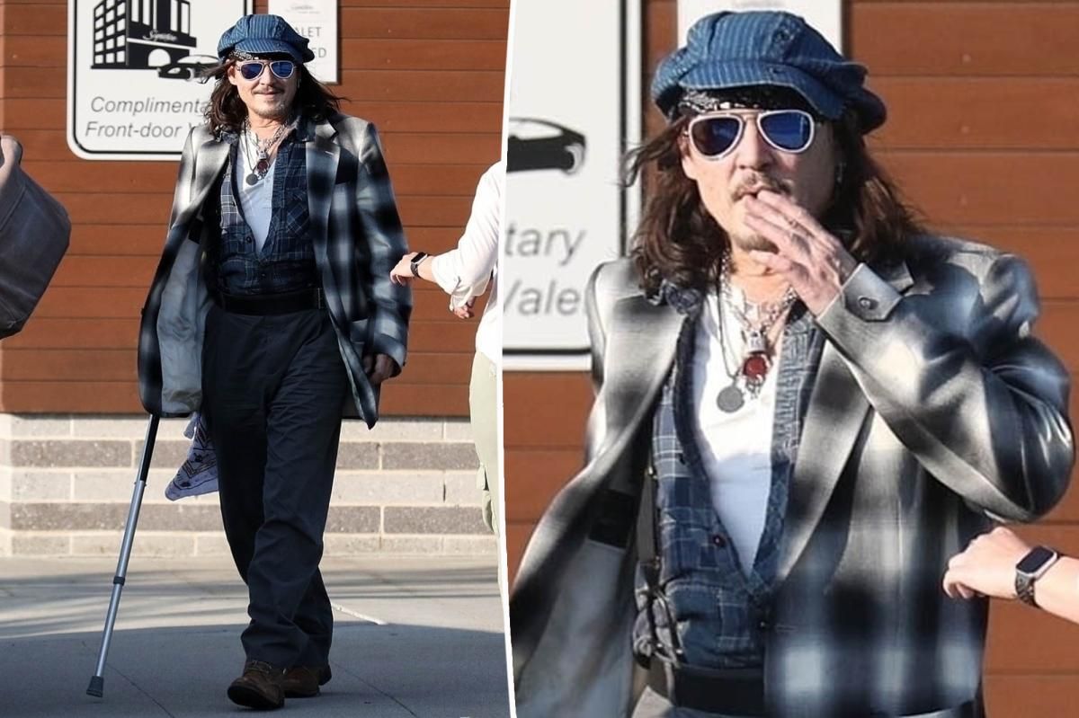 Johnny Depp, 60, seen using cane at Boston gig after injuring ankle